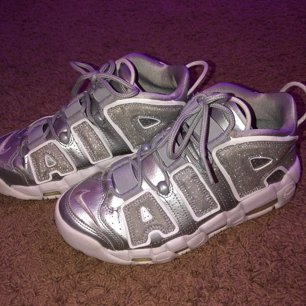 Nike UpTempo Shoes. They are a size 8 in women’s.